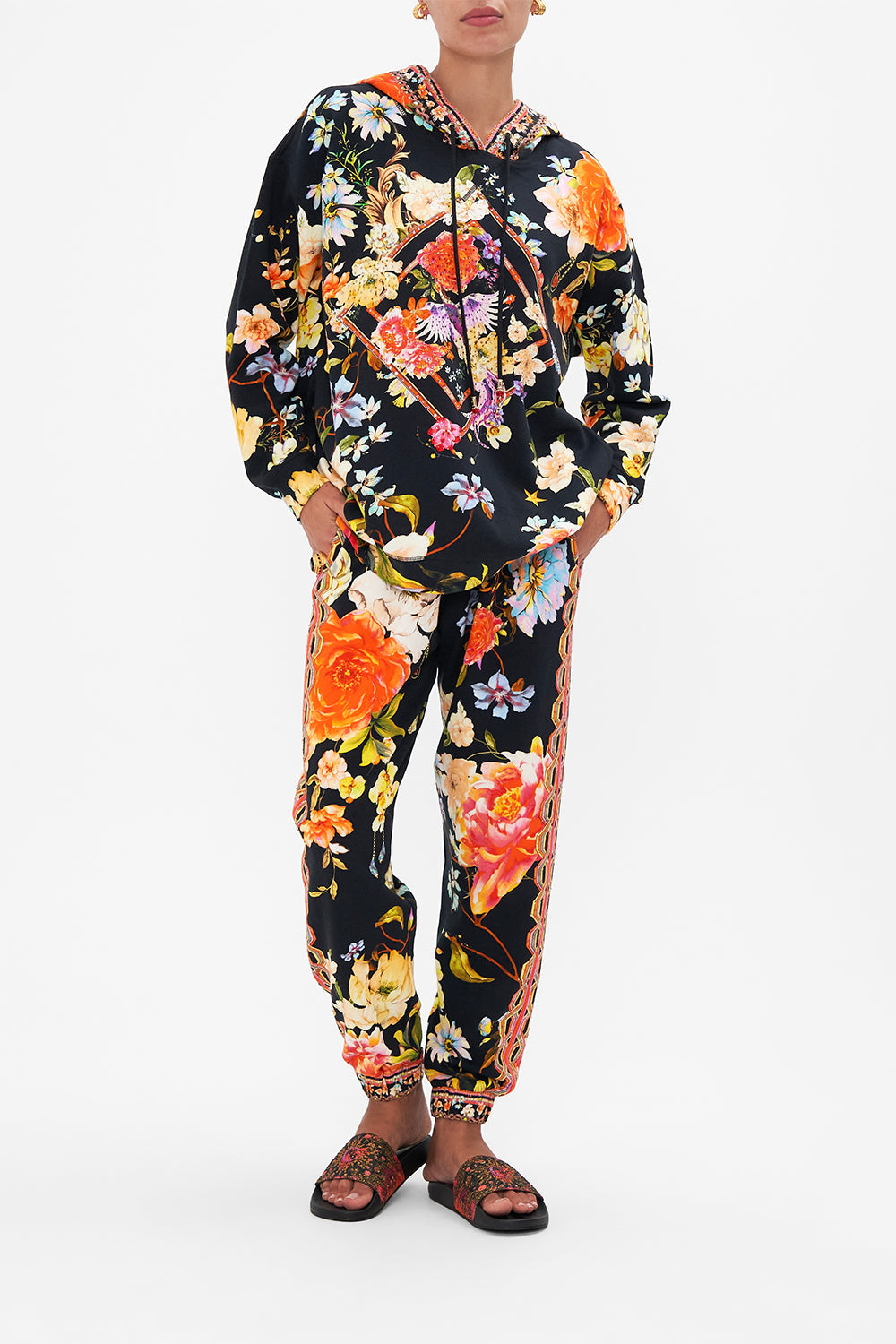 Front view of model wearing CAMILLA hoody in Secret History print