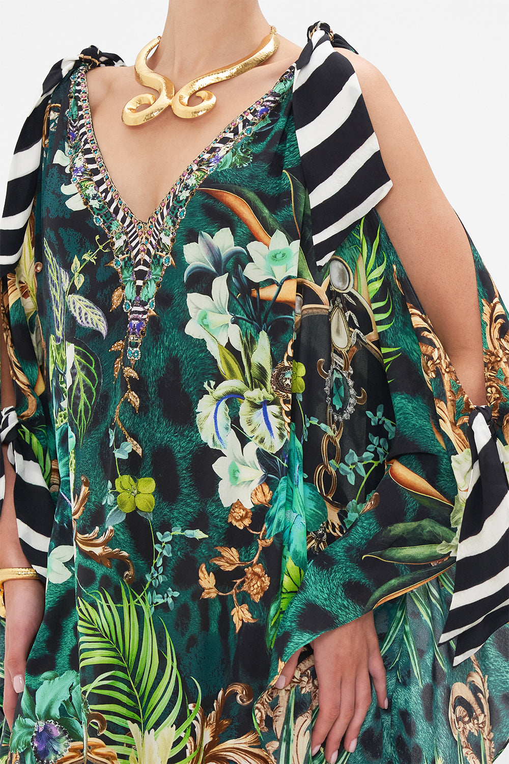 Detail view of model wearing CAMILLA silk kaftan in Sing My Song print