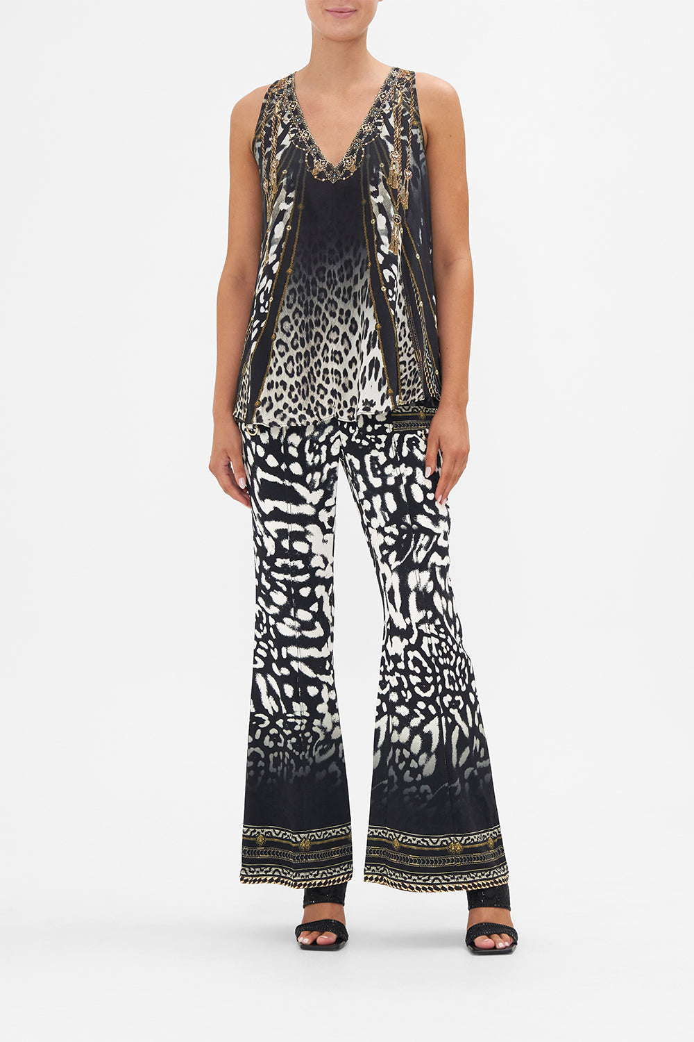 Front view of model wearing CAMILLA silk animal print tank top in Untamed Royalty print