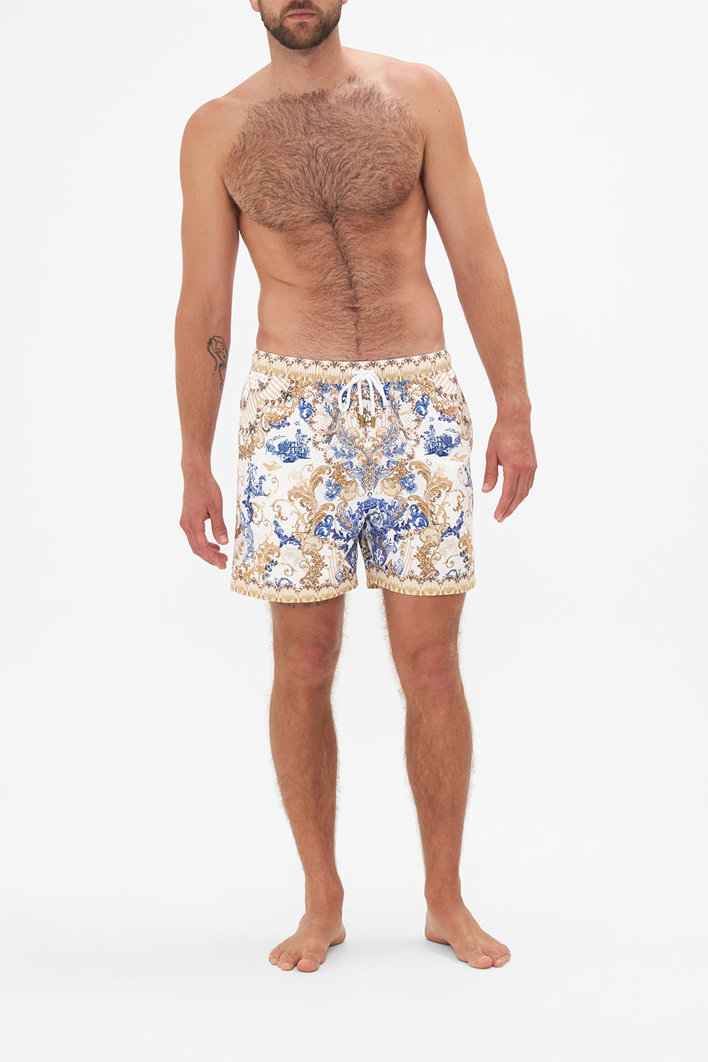Front view of model wearing Hotel Franks by CAMILLA mens white boardshorts in Soul Searching print