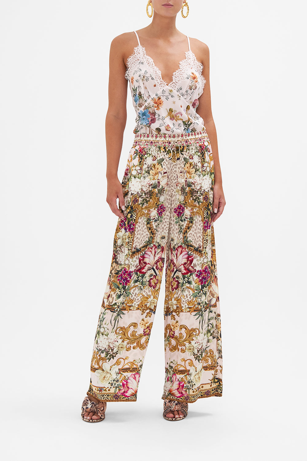 Front view of model wearing CAMILLA leg pants in Bambino Bliss print