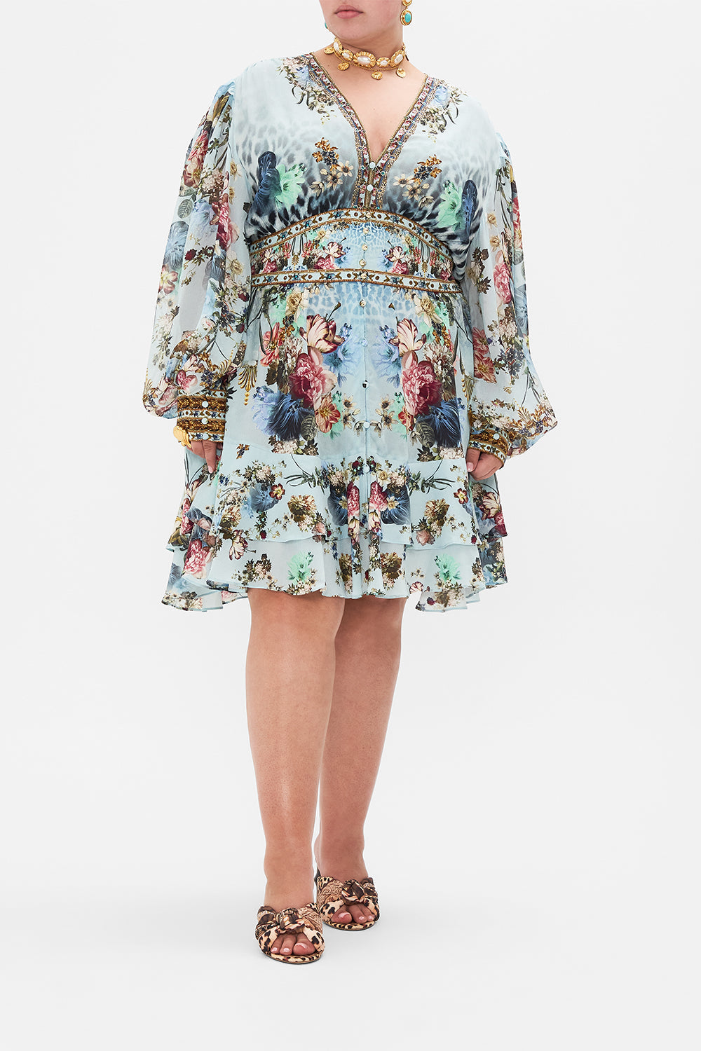 Front view of curvy model wearing CAMILLA plus size silk floral dress in Letters to Leo print