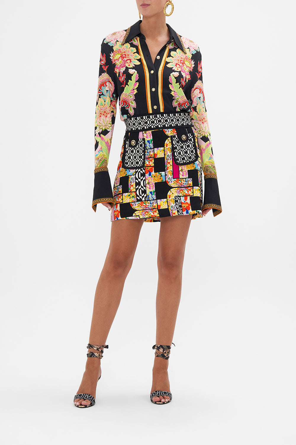 Front view of model wearing CAMILLA mini skirt in Signora Milano print