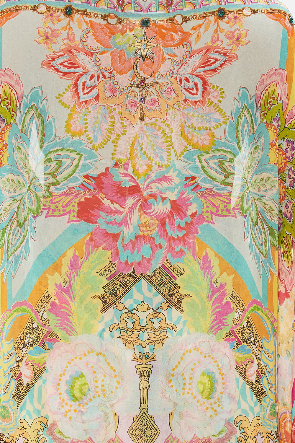 Detail view of model wearing CAMILLA silk shrug in An Italian Welcome print