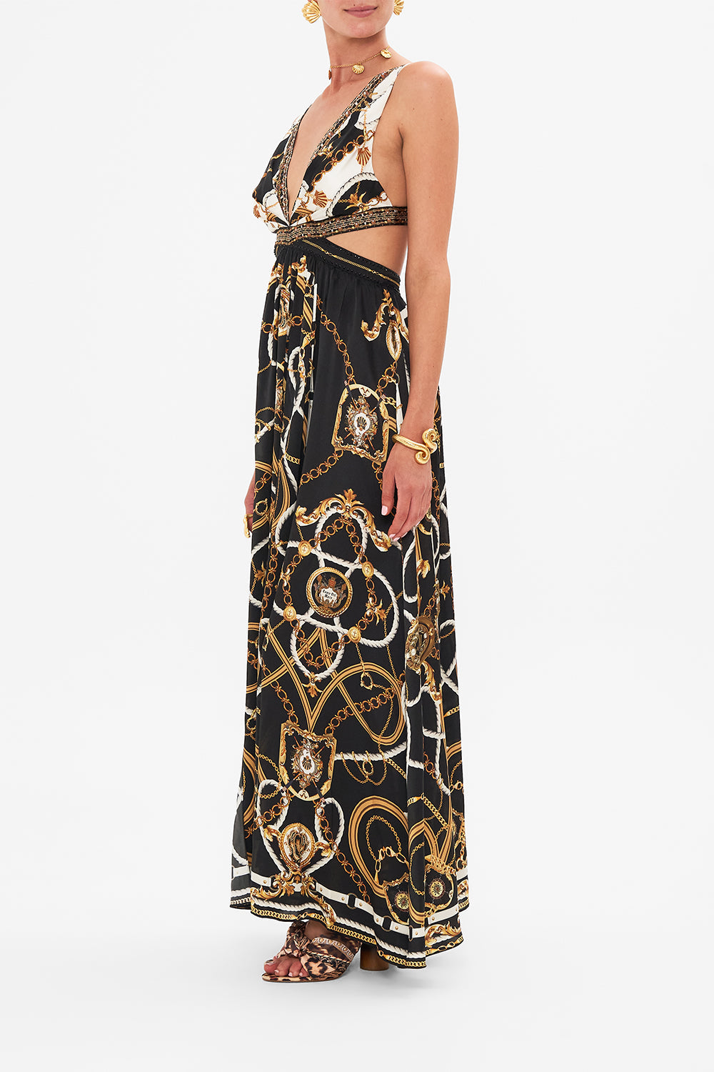 Side view of model wearing CAMILLA silk cut out dress in Coast To Coast print