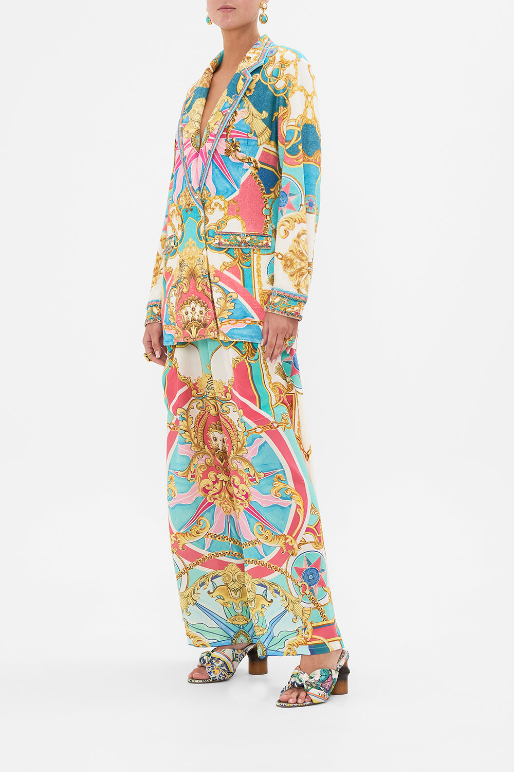 Side view of model wearing CAMILLA silk jacket in Sail Away With Me print 