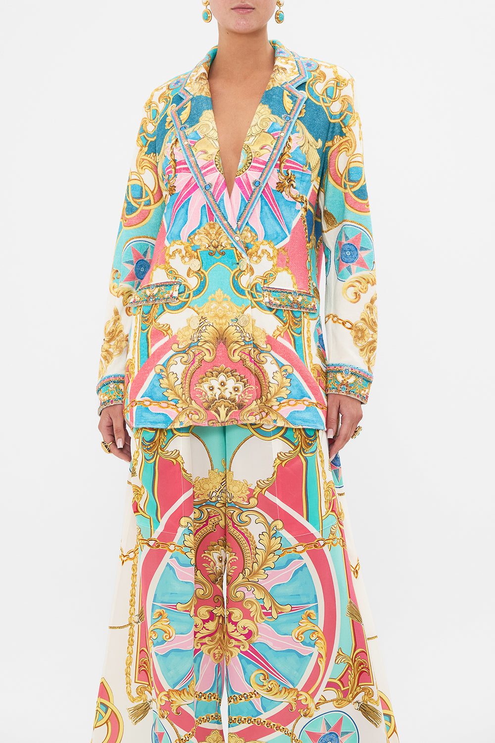 Detail view of model wearing CAMILLA silk jacket in Sail Away With Me print 