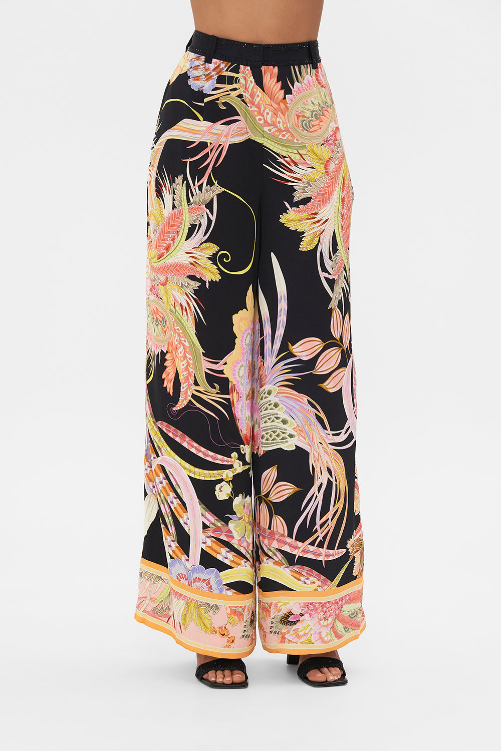 Crop view of model wearing CAMILLA designer wide leg pants in Lady of The Moon print