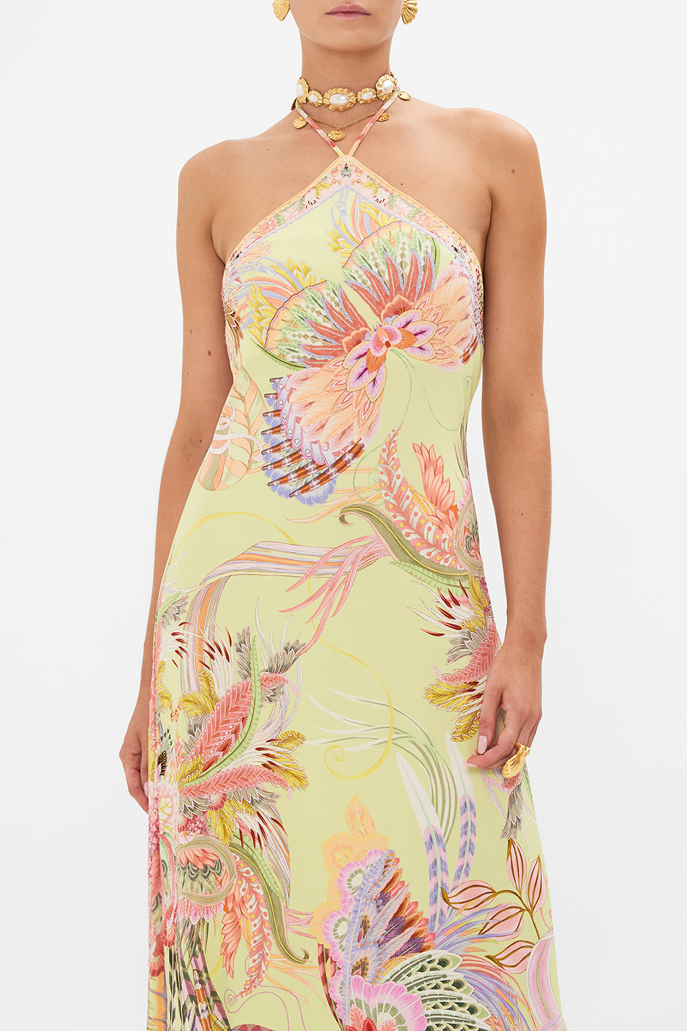 Crop view of model wearing CAMILLA jersey maxi dress in Cosmic Tuscan print