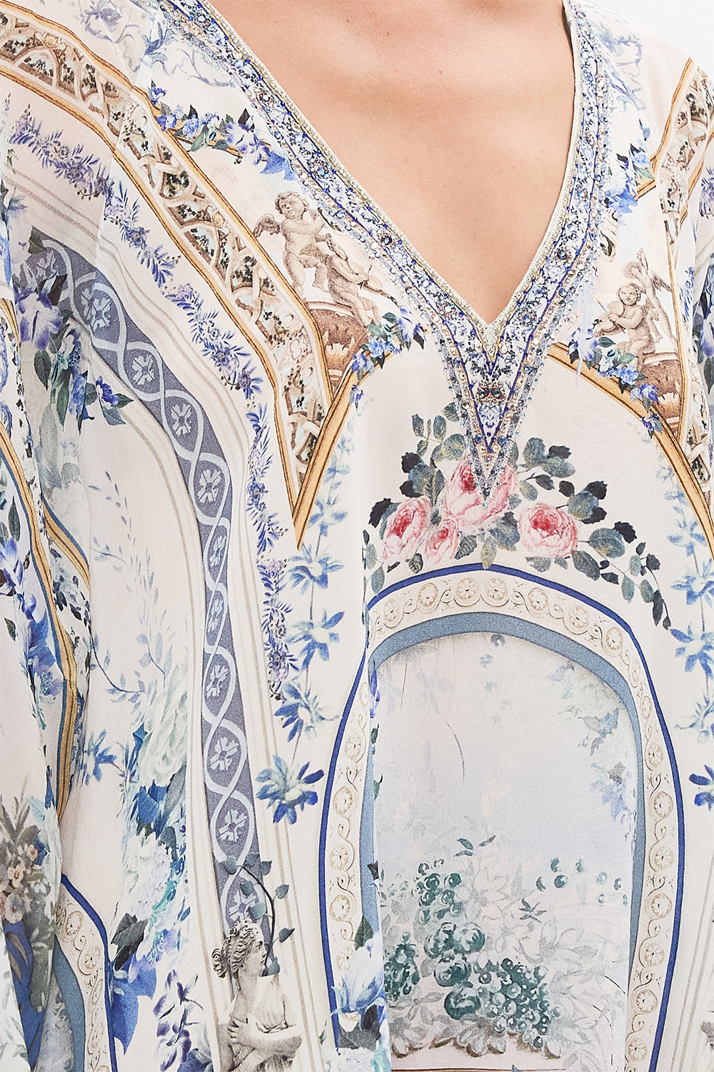 Detail  view of model wearing CAMILLA silk kaftan in Season of The Siren print