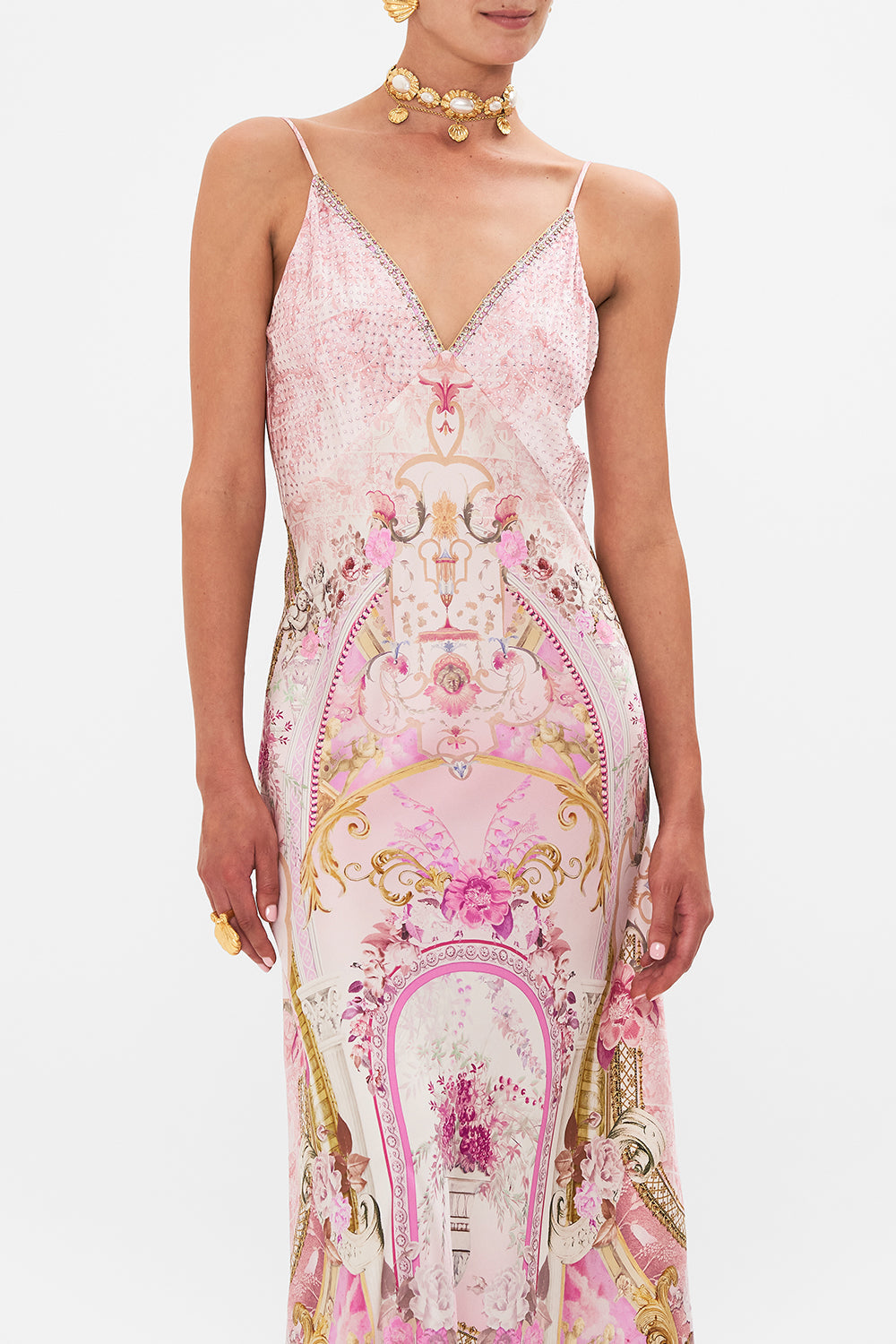 Crop view of model wearing CAMILLA silk slip dress in Fresco Fairytale print