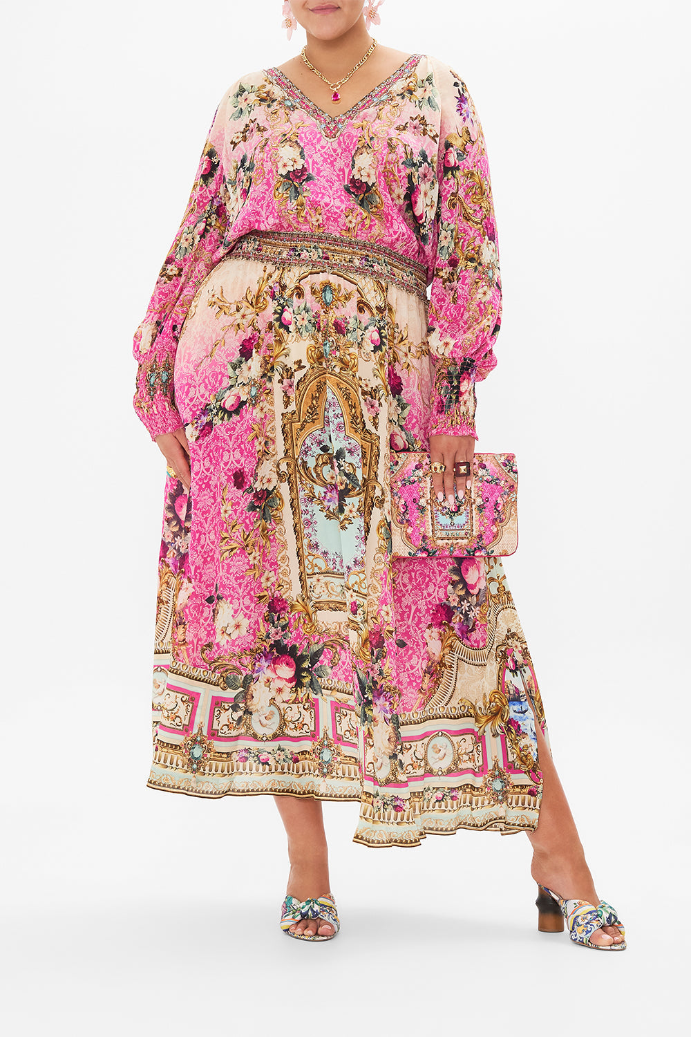 Front view of curvy model wearing CAMILLA plus size silk maxi dress in Call Of The Canal print