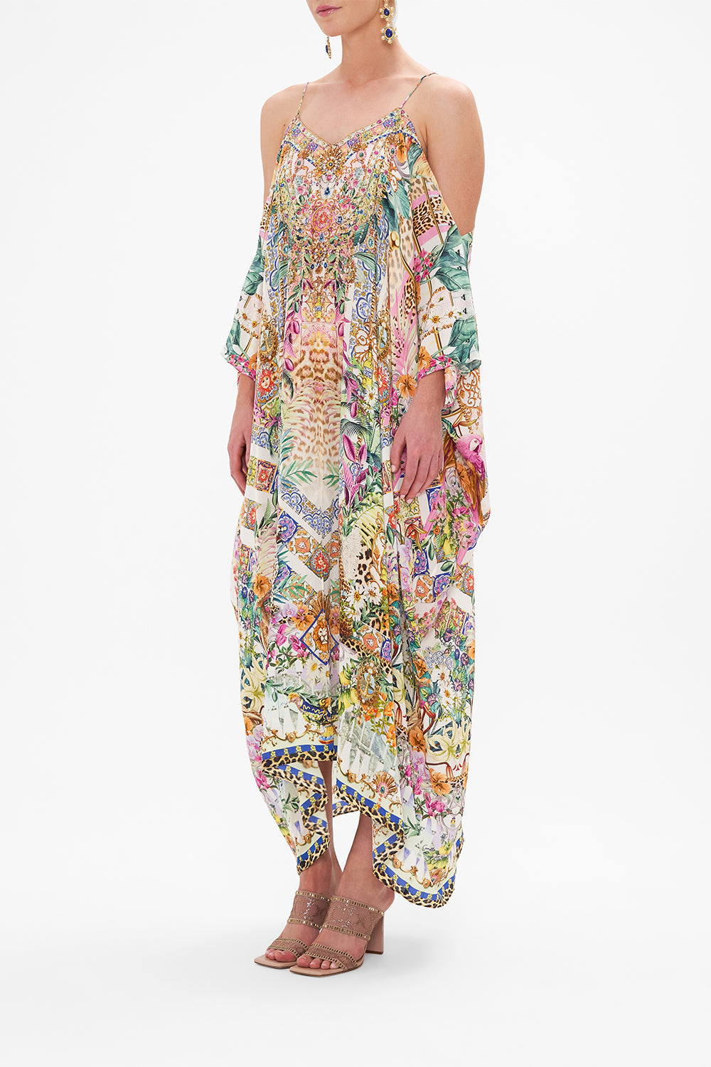 Side view of model wearing CAMILLA resortwear kaftan in Flowers Of Neptune print 