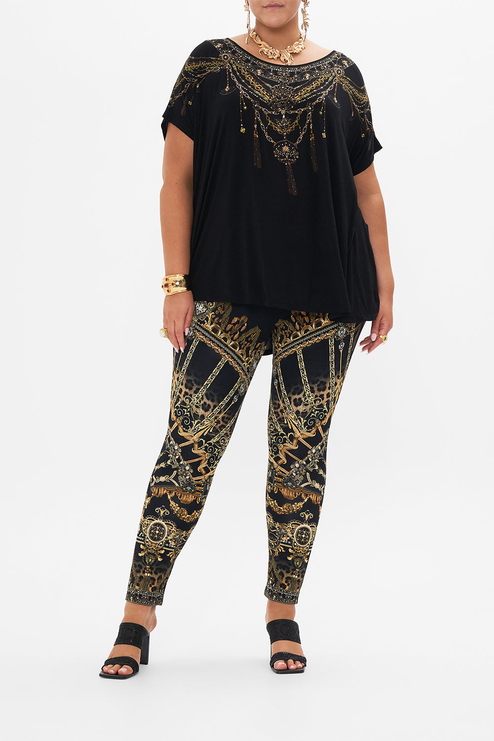 Front view of curvy model wearing CAMILLA plus size black t shirt in Masked At Moonlight print