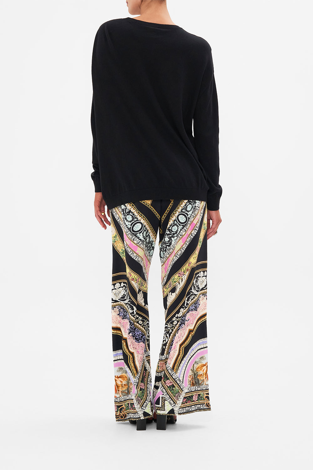 Back view of model wearing CAMILLA knit jumper in Florence Field Day print 