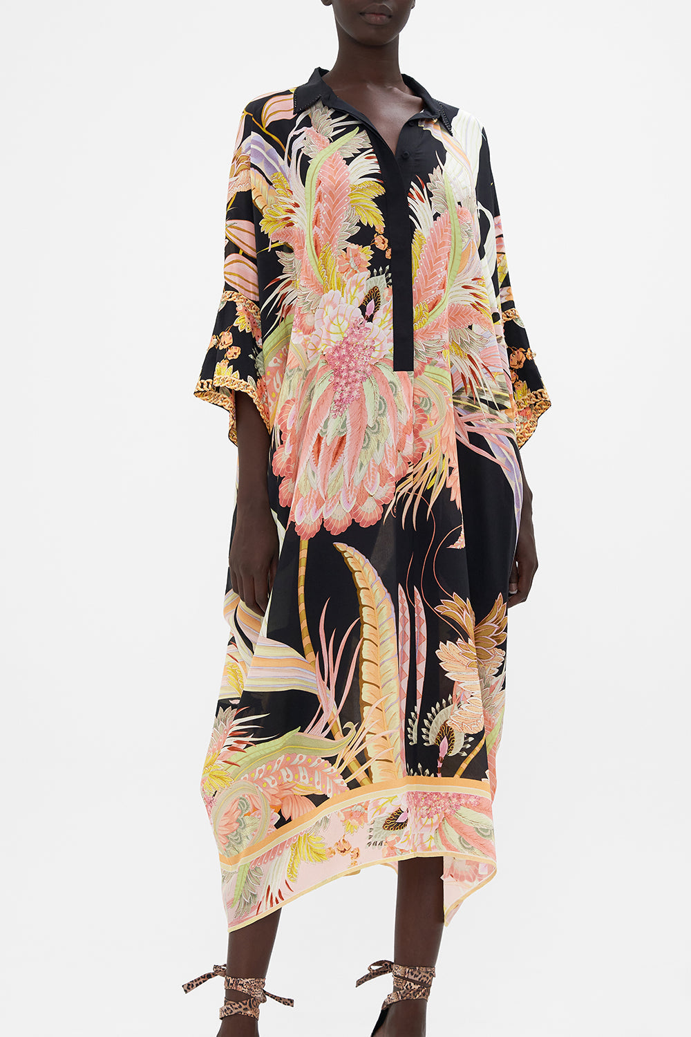 Crop view of model wearing CAMILLA silk kaftan in Lady Of The Moon print