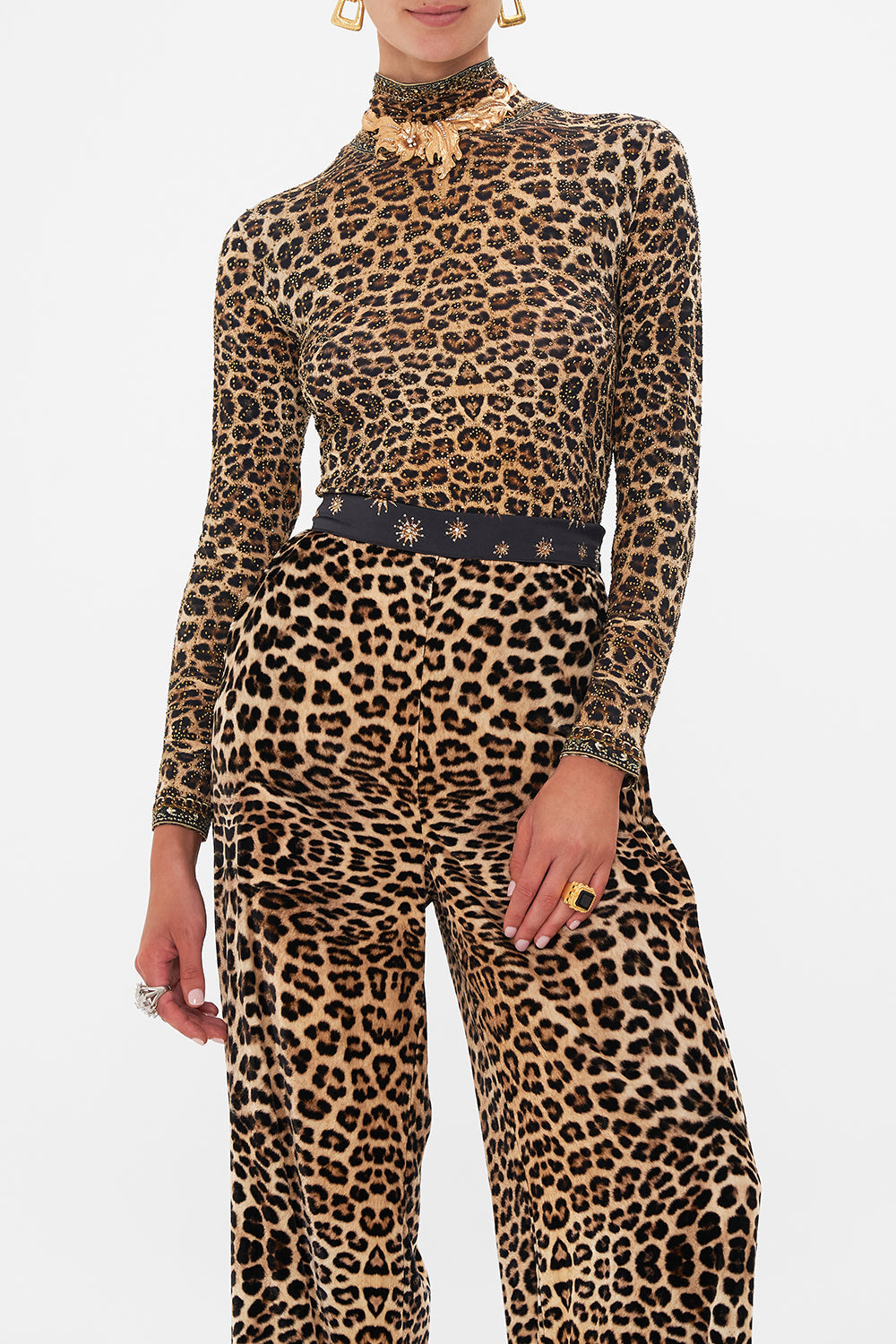 Detail view of model wearing CAMILLA jersey turtleneck print in Soul Of A Star Gazer print