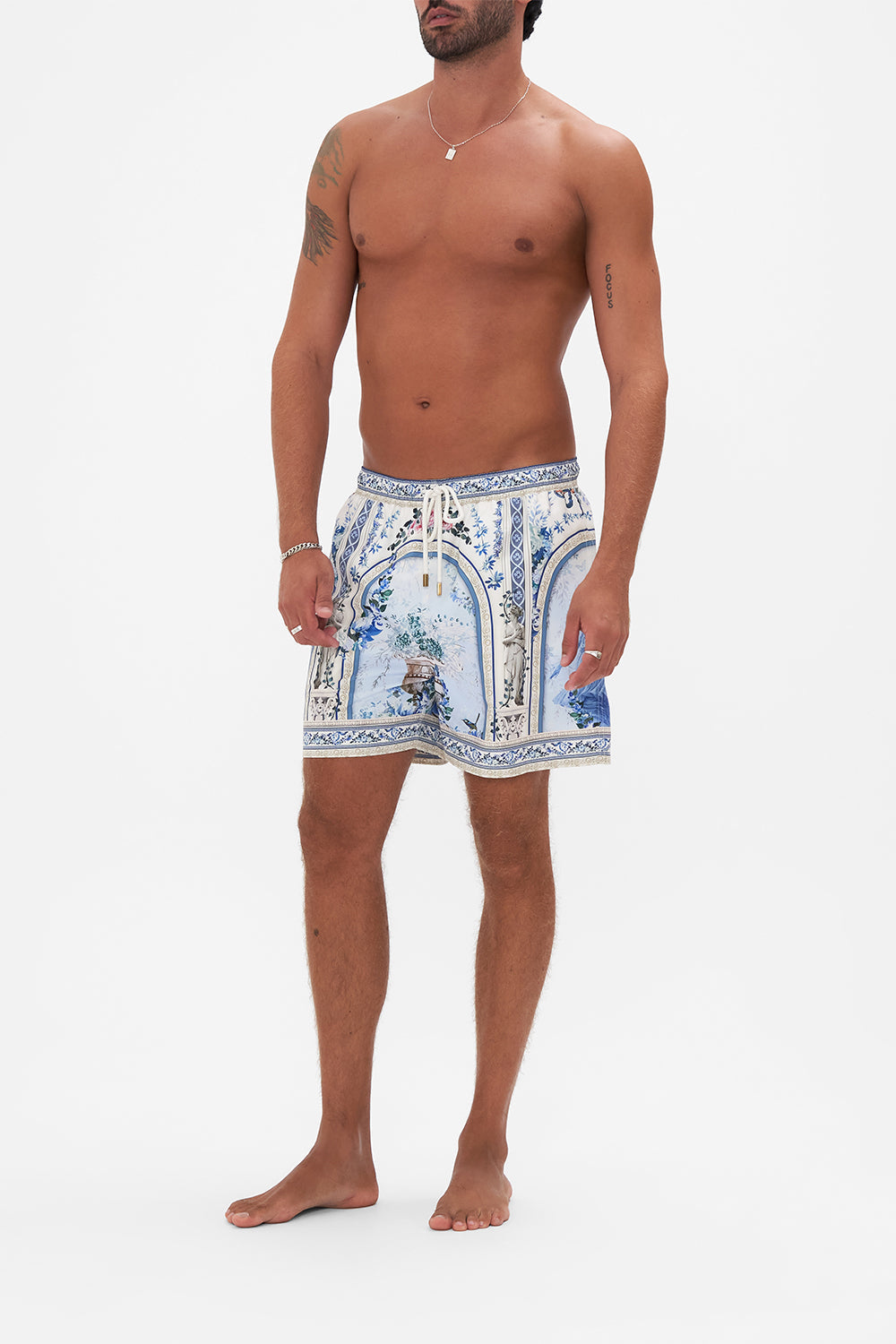 Front view of model wearing Hotel Franks by CAMILLA mens boardshort in Season Of The Siren print 