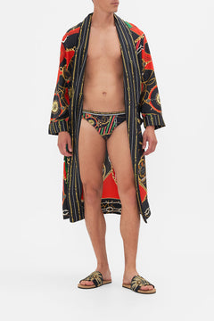 Front view of model wearing Hotel Franks By CAMILLA mens swim breif in Club Aperitivo print