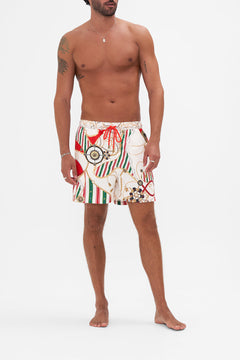 Front view of model wearing Hotel franks By CAMILLA mens boardshort in Saluti Summertime print
