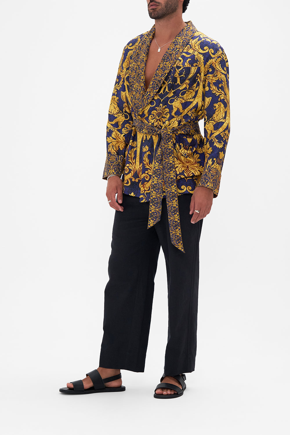 Side view of model wearing Hotel Franks by CAMILLA mens silk robe in Venice Vignette print 