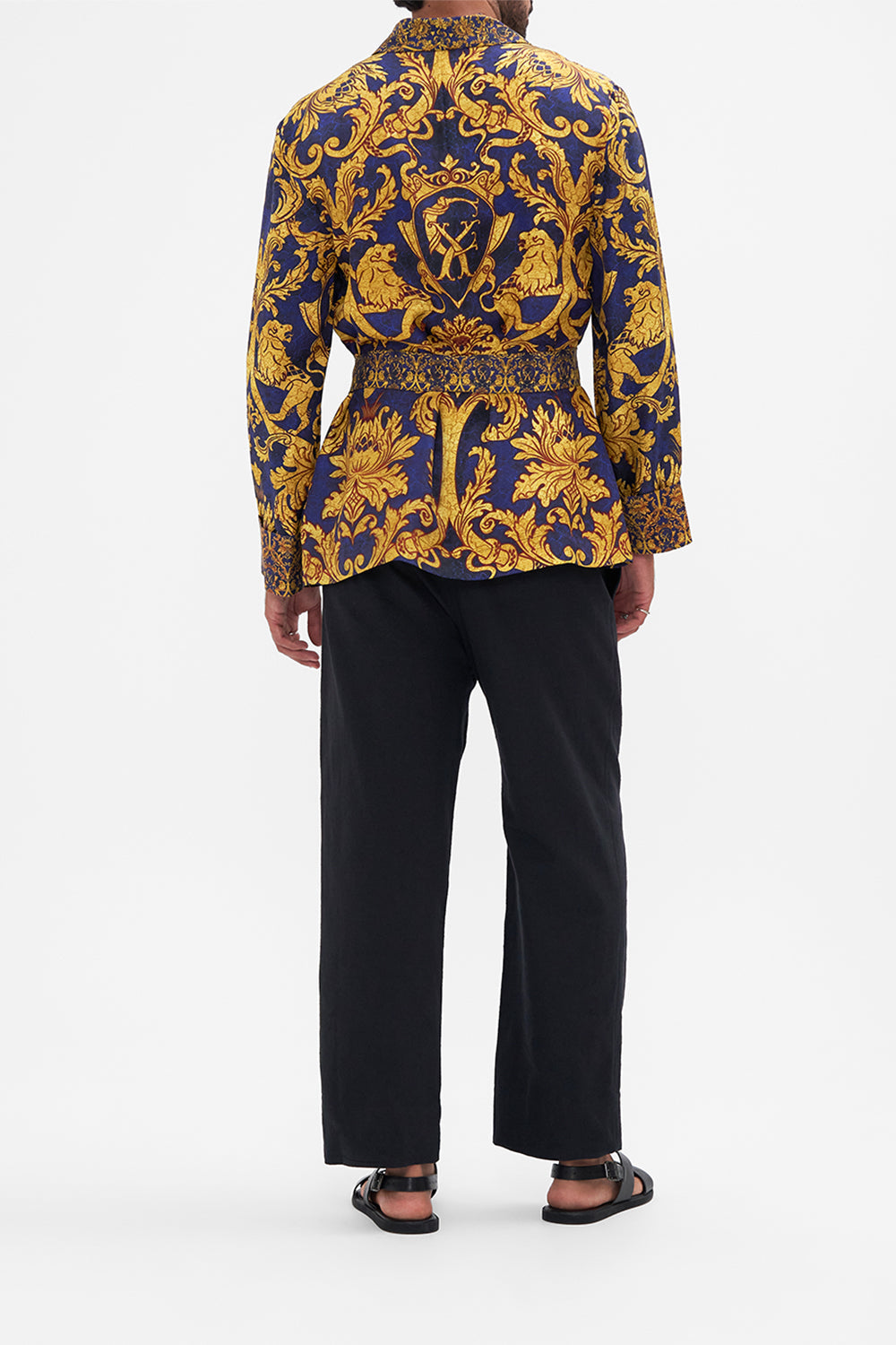 Back view of model wearing Hotel Franks by CAMILLA mens silk robe in Venice Vignette print 
