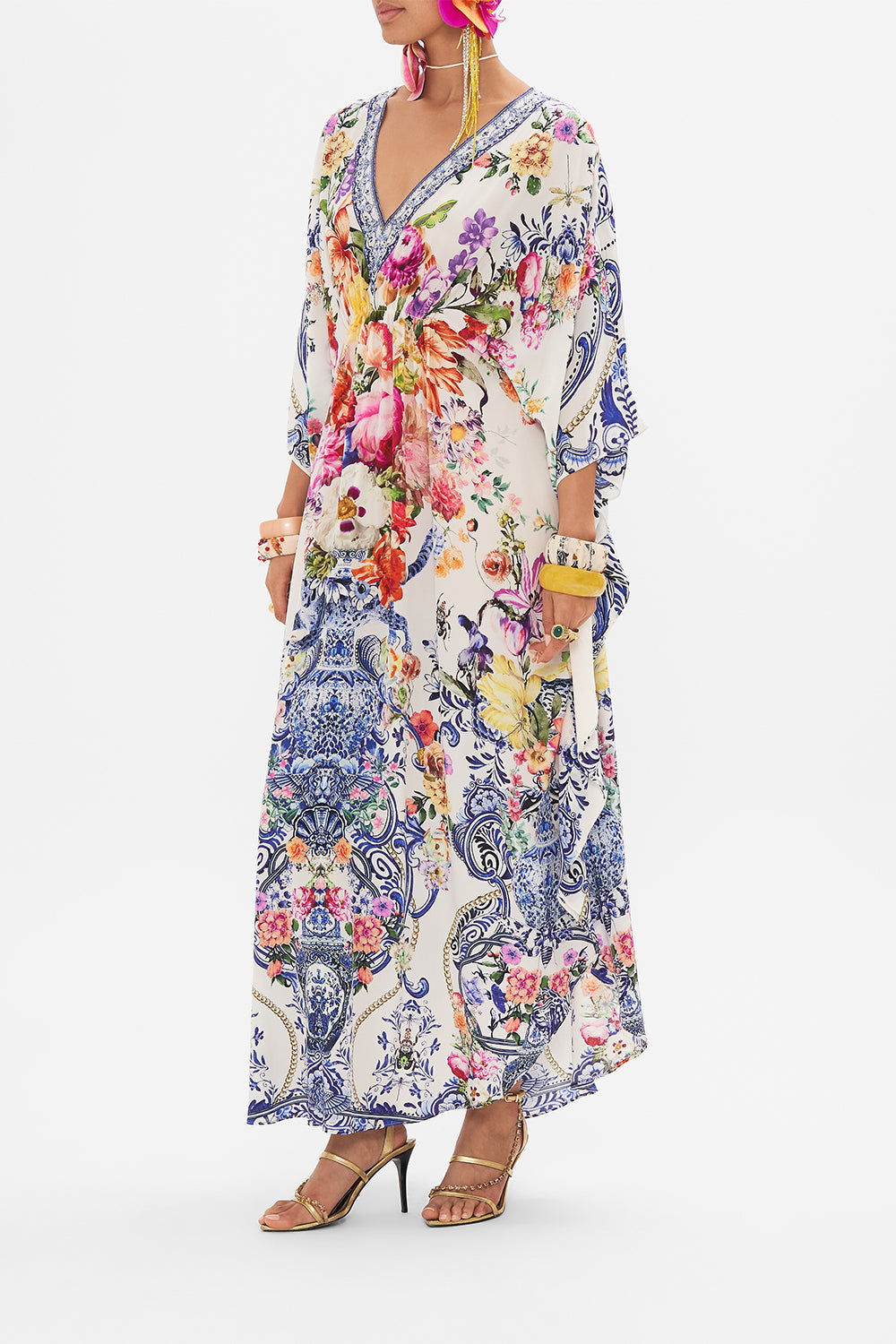 Side view of model wearing CAMILLA silk kaftan in Dutch Is Life print