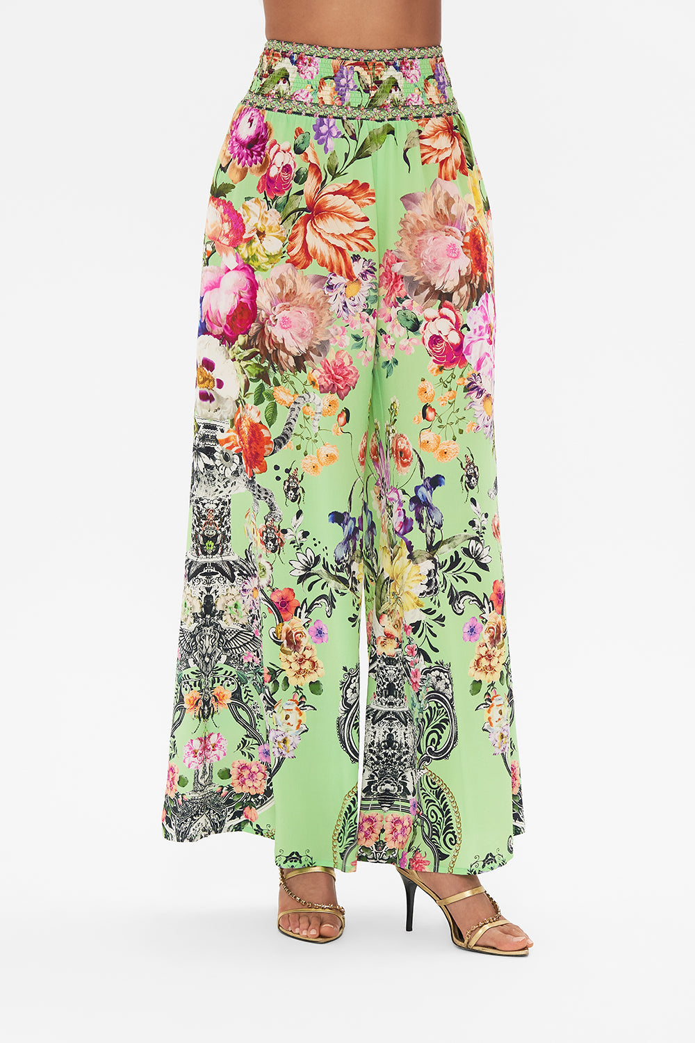 Detail view of model wearing CAMILLA silk shirt dress in Delft Dynasty print