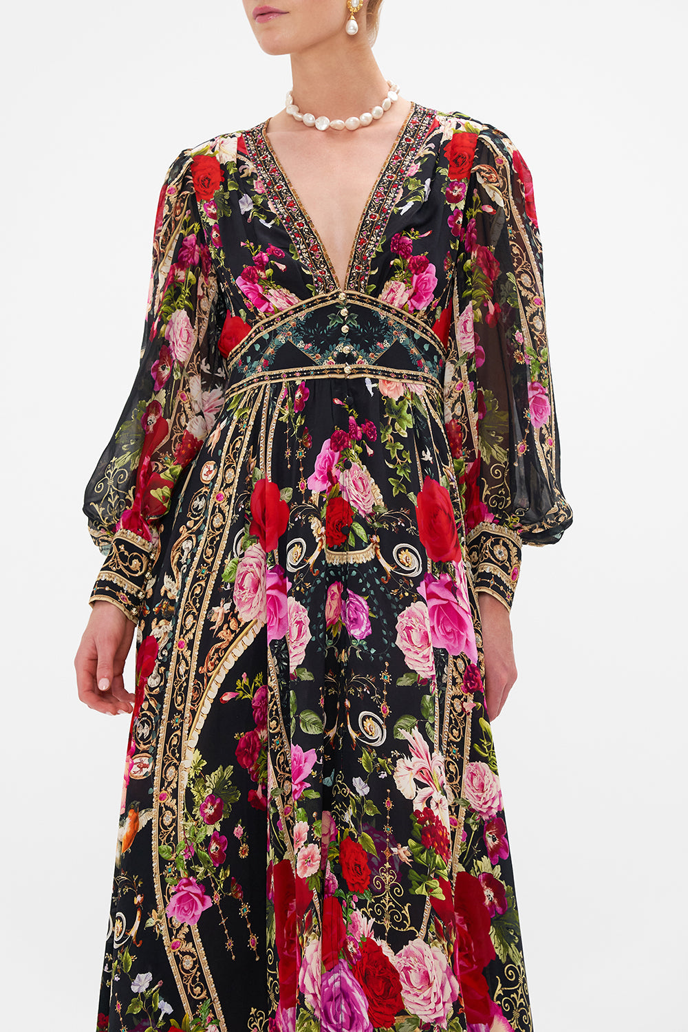 Crop view of model wearing CAMILLA floral dress in Reservation For Love print 