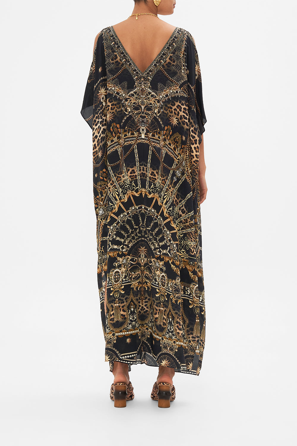 Back view of model wearing CAMILLA silk kaftan with hardware in Masked  at Moonlight print