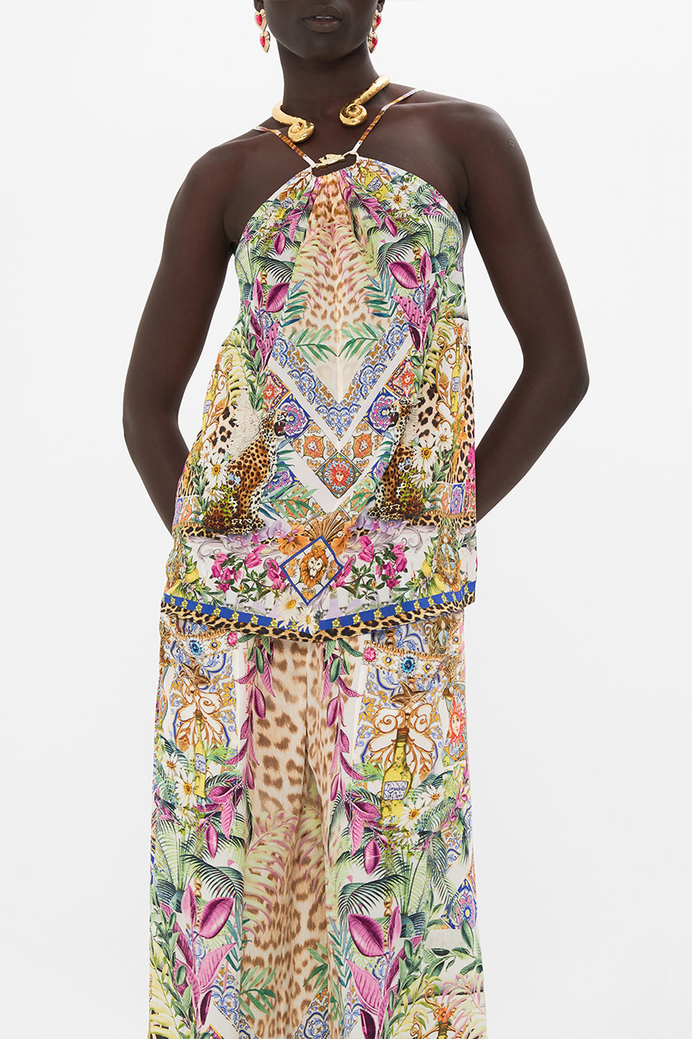 Crop view of model wearing CAMILLA floral halter top in Flowers Of Neptune print