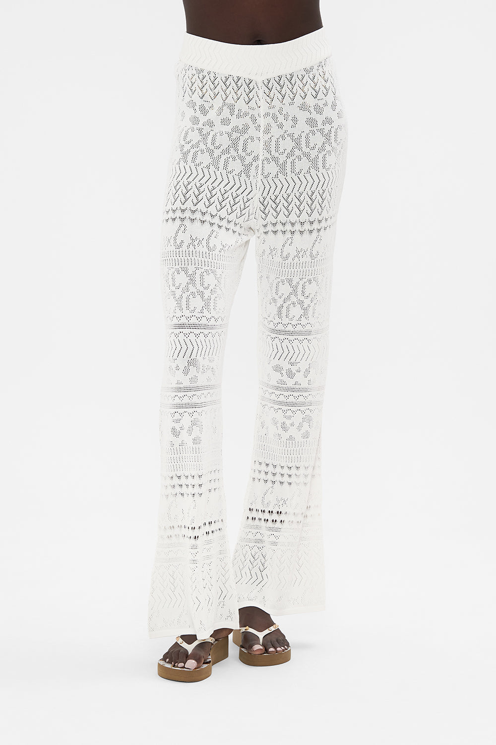 Crop view of model wearing CAMILLA knit pants in Sea Charm 