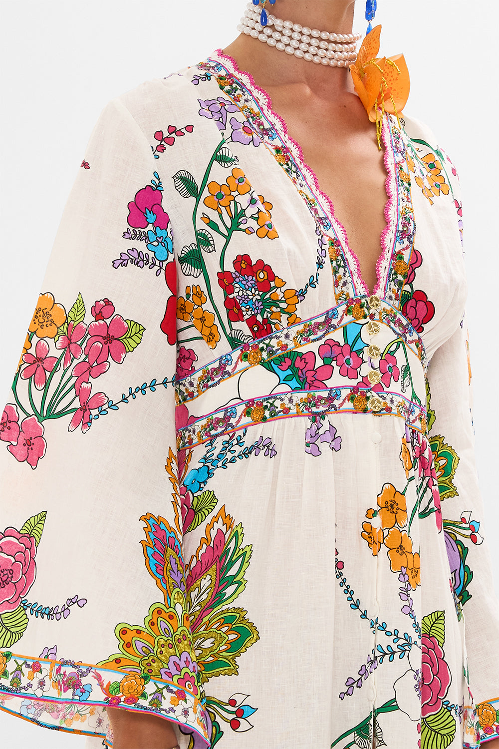 The CAMILLA DRESS WITH TIERED SKIRT COSMIC PRAIRIE in our  print.