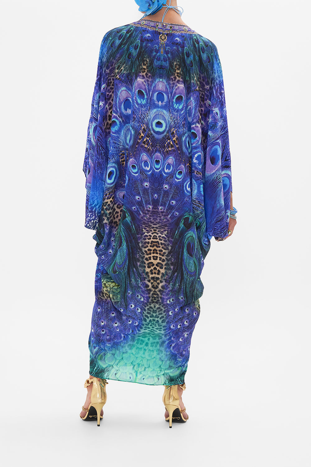 Back view of model wearing CAMILLA silk kaftan in Peacock Rock print