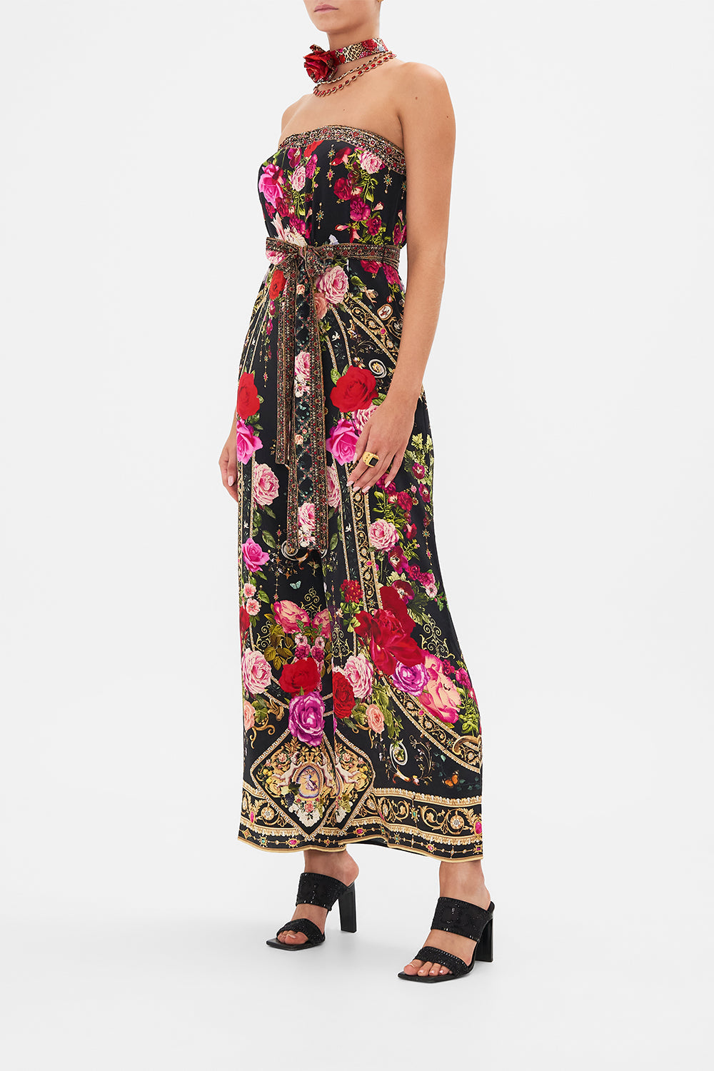 Side view of model wearing CAMILLA floral silk jumpsuit  in Reservation For Love print