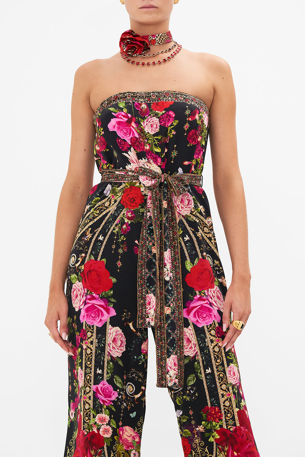 Crop view of model wearing CAMILLA floral silk jumpsuit  in Reservation For Love print