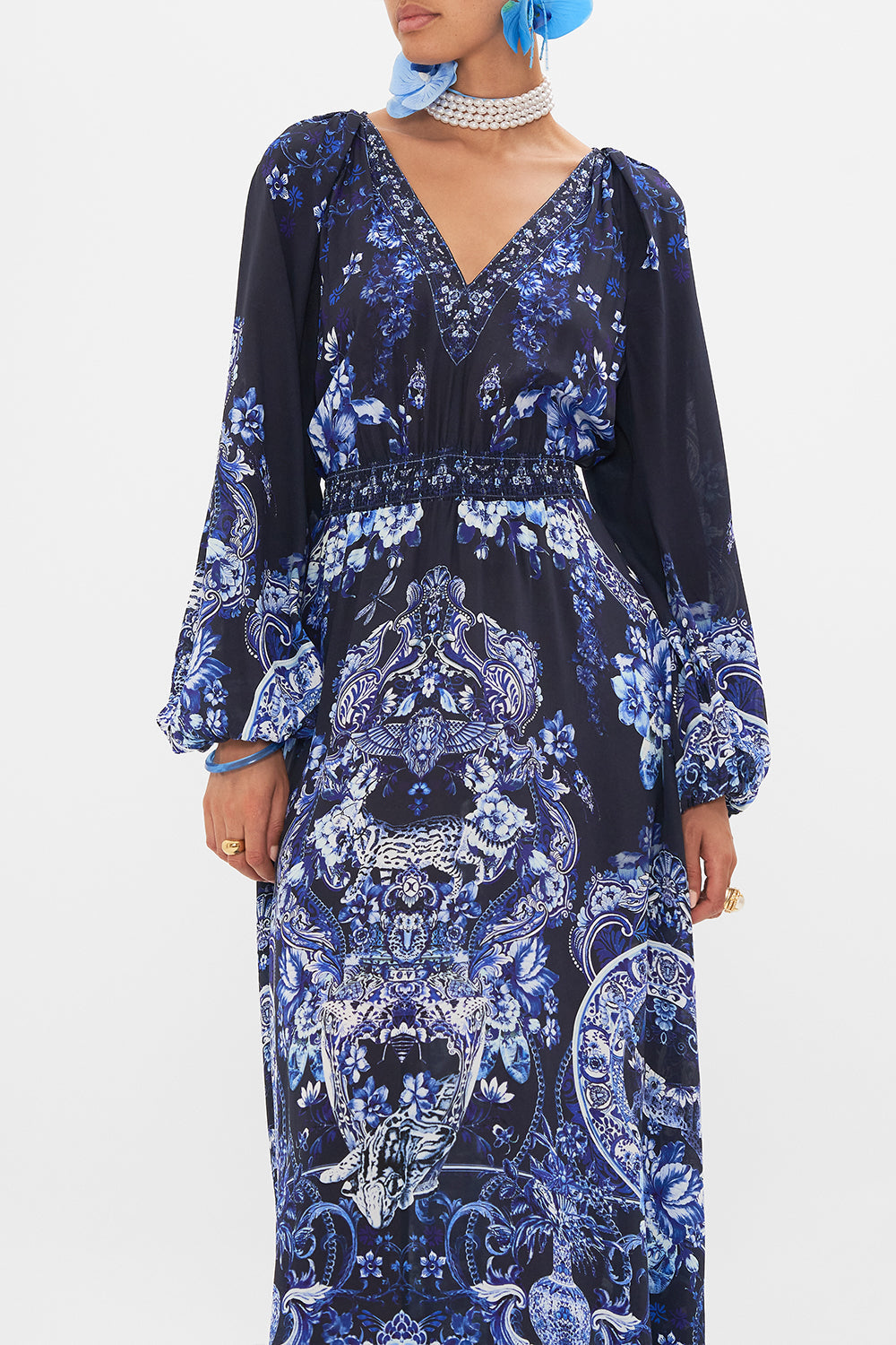 Crop view of model wearing CAMILLA silk dress in Delft Dynasty print