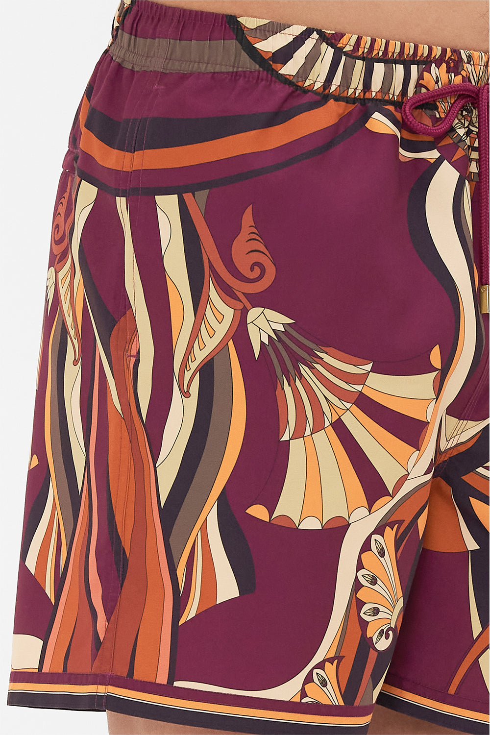 The CAMILLA MID LENGTH BOARDSHORT DESERT DELIRIUM in our  print.