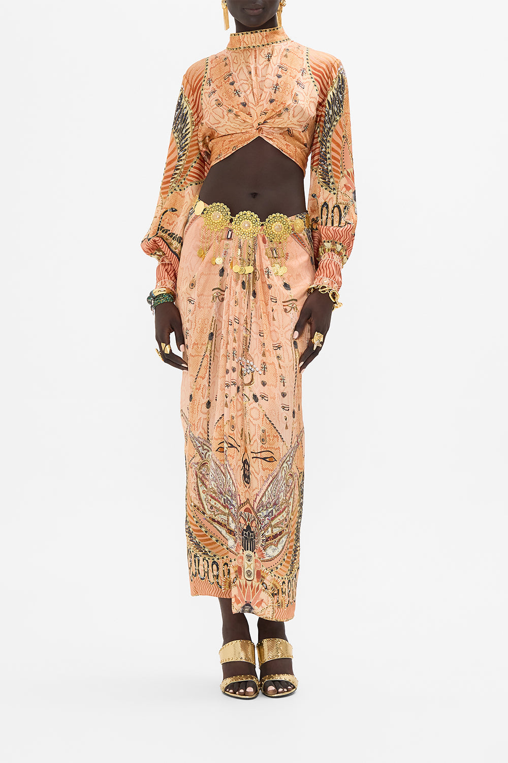 The CAMILLA LONG SLEEVE HIGH NECK TOP WITH FRONT KNOT KINGDOM OF HEIROGLYPHS in our KINGDOM OF HEIROGLYPHS print.