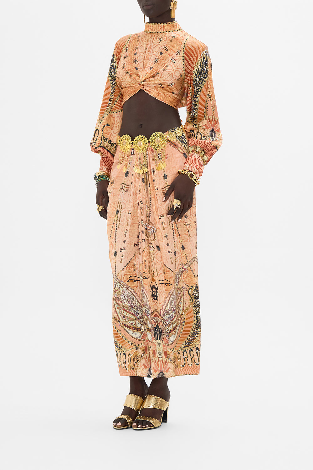 The CAMILLA LONG SLEEVE HIGH NECK TOP WITH FRONT KNOT KINGDOM OF HEIROGLYPHS in our  print.