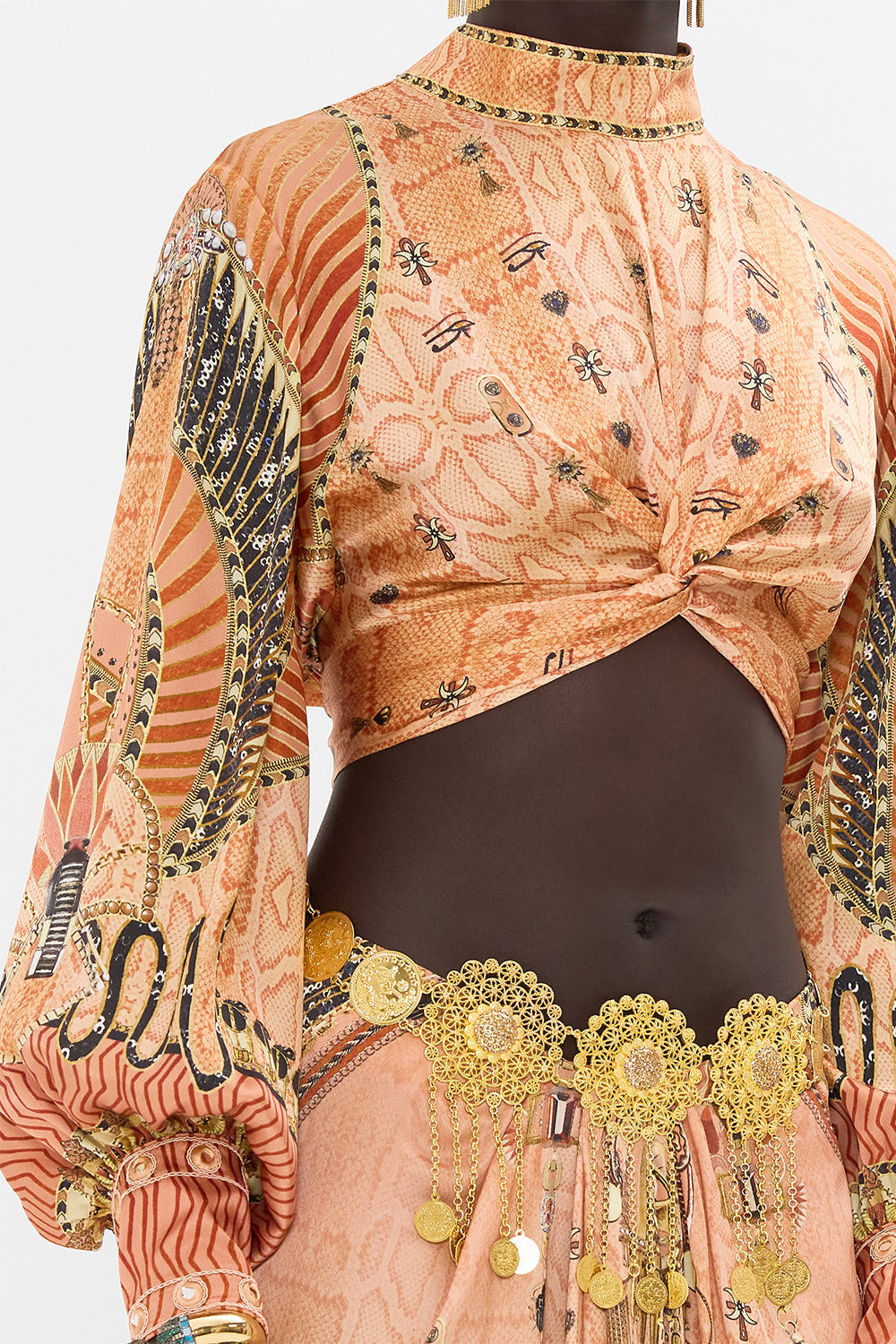 The CAMILLA LONG SLEEVE HIGH NECK TOP WITH FRONT KNOT KINGDOM OF HEIROGLYPHS in our  print.