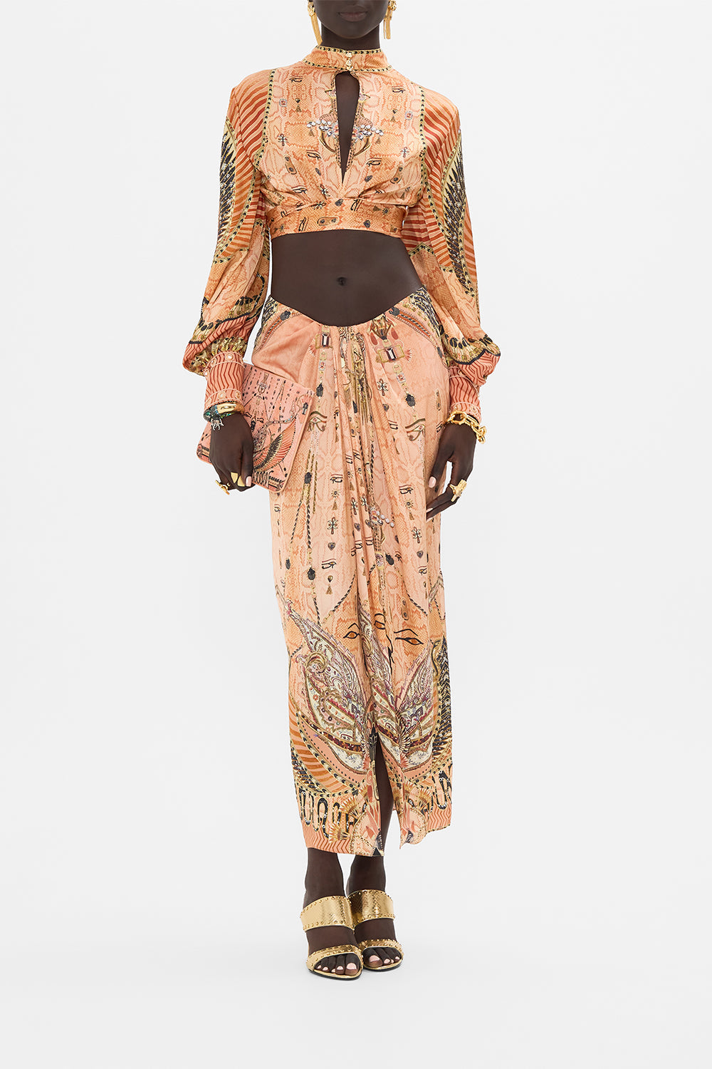The CAMILLA LONG SLEEVE HIGH NECK TOP WITH FRONT KNOT KINGDOM OF HEIROGLYPHS in our  print.