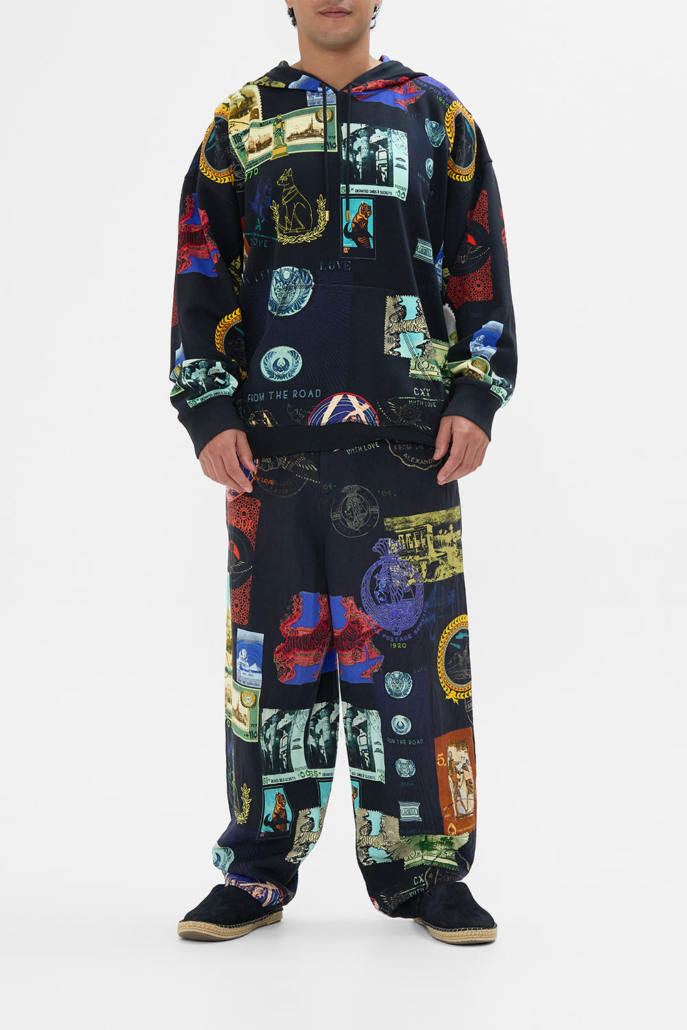 Hotel Franks By CAMILLA black relaxed dropped crotch pant in Landmark and Love Letters print. 