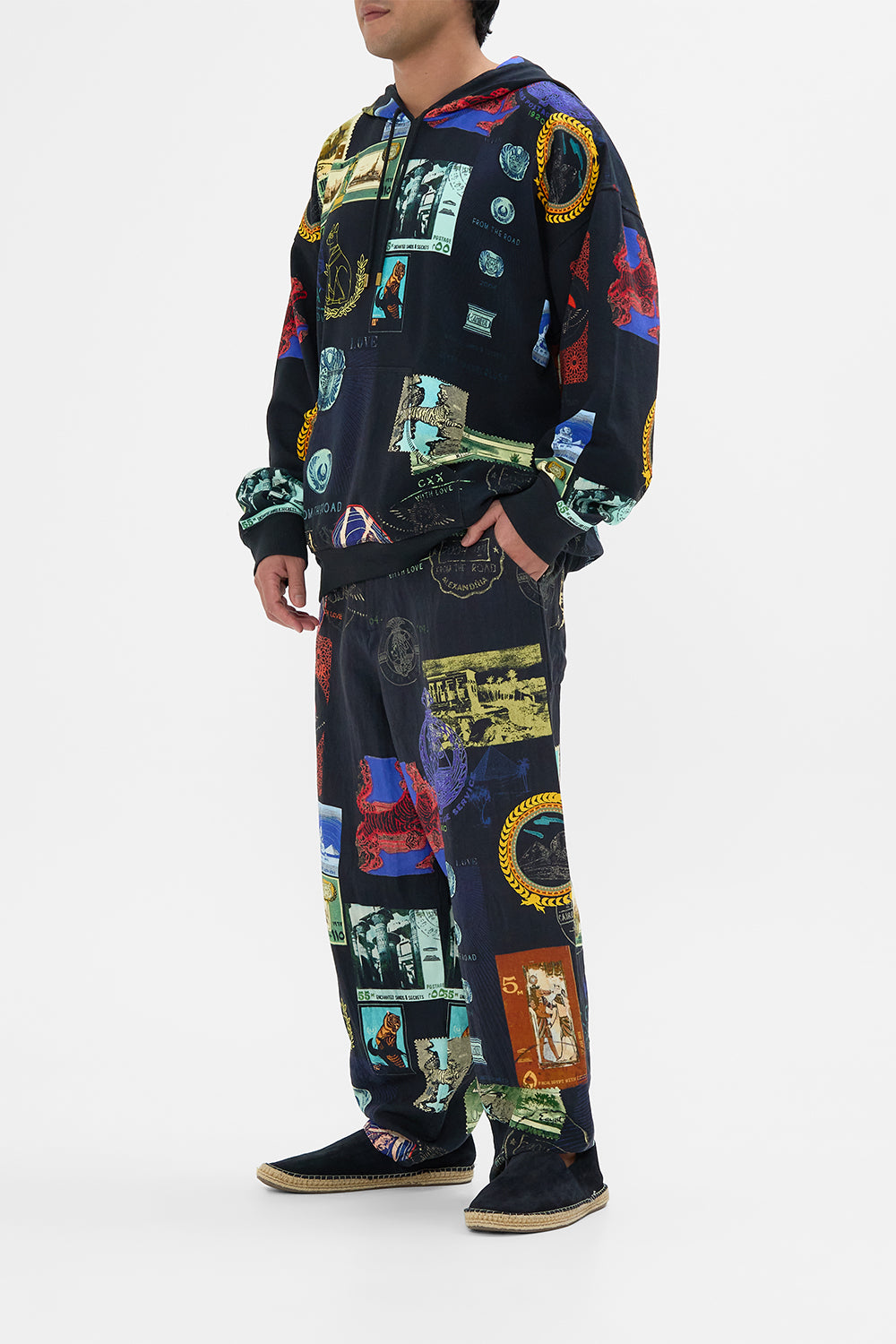 Hotel Franks By CAMILLA black relaxed dropped crotch pant in Landmark and Love Letters print. 