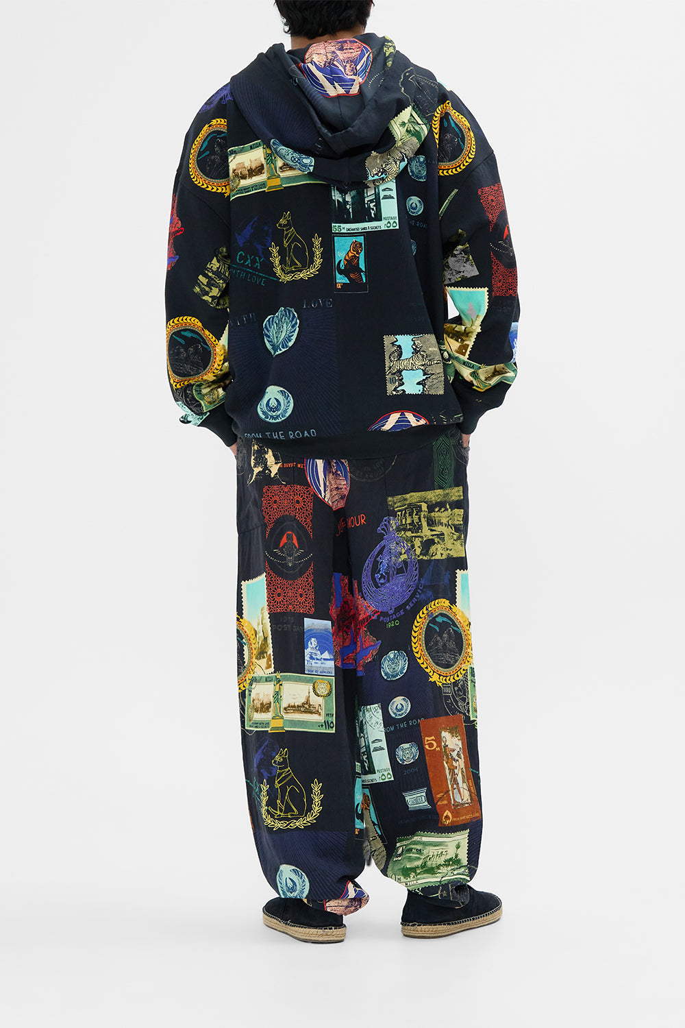 Hotel Franks By CAMILLA black relaxed dropped crotch pant in Landmark and Love Letters print. 