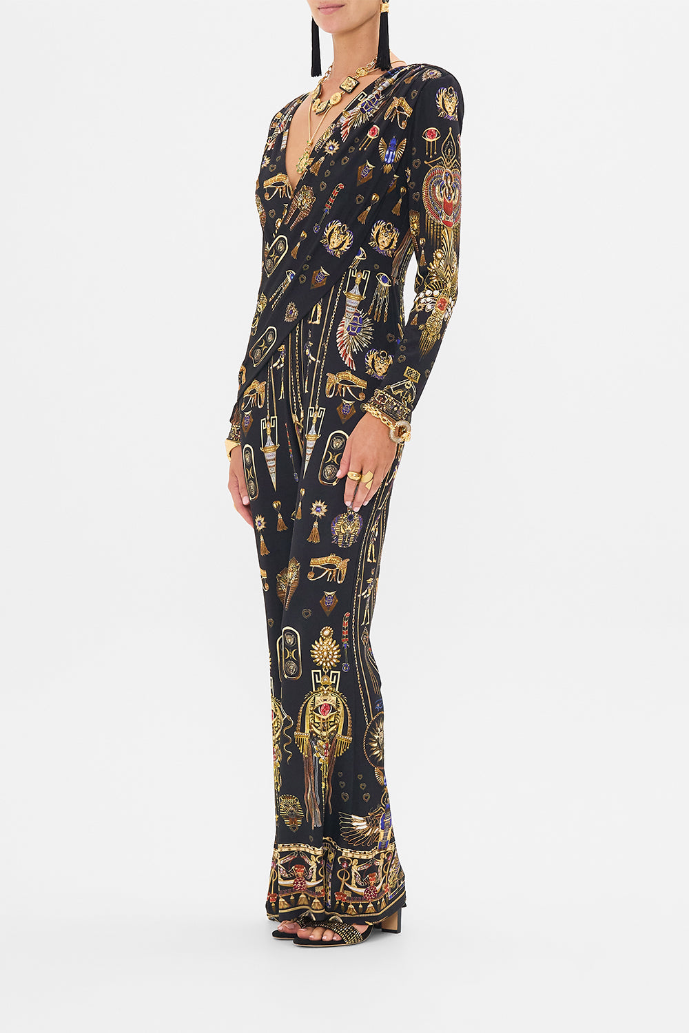 CAMILLA Draped V Neck Jersey Flared Jumpsuit in Cartouche Kingdom print. 