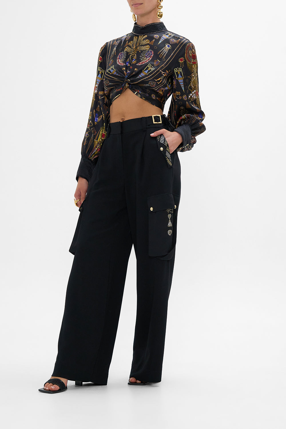 The CAMILLA LONG SLEEVE HIGH NECK TOP WITH FRONT KNOT CARTOUCHE KINGDOM in our  print.