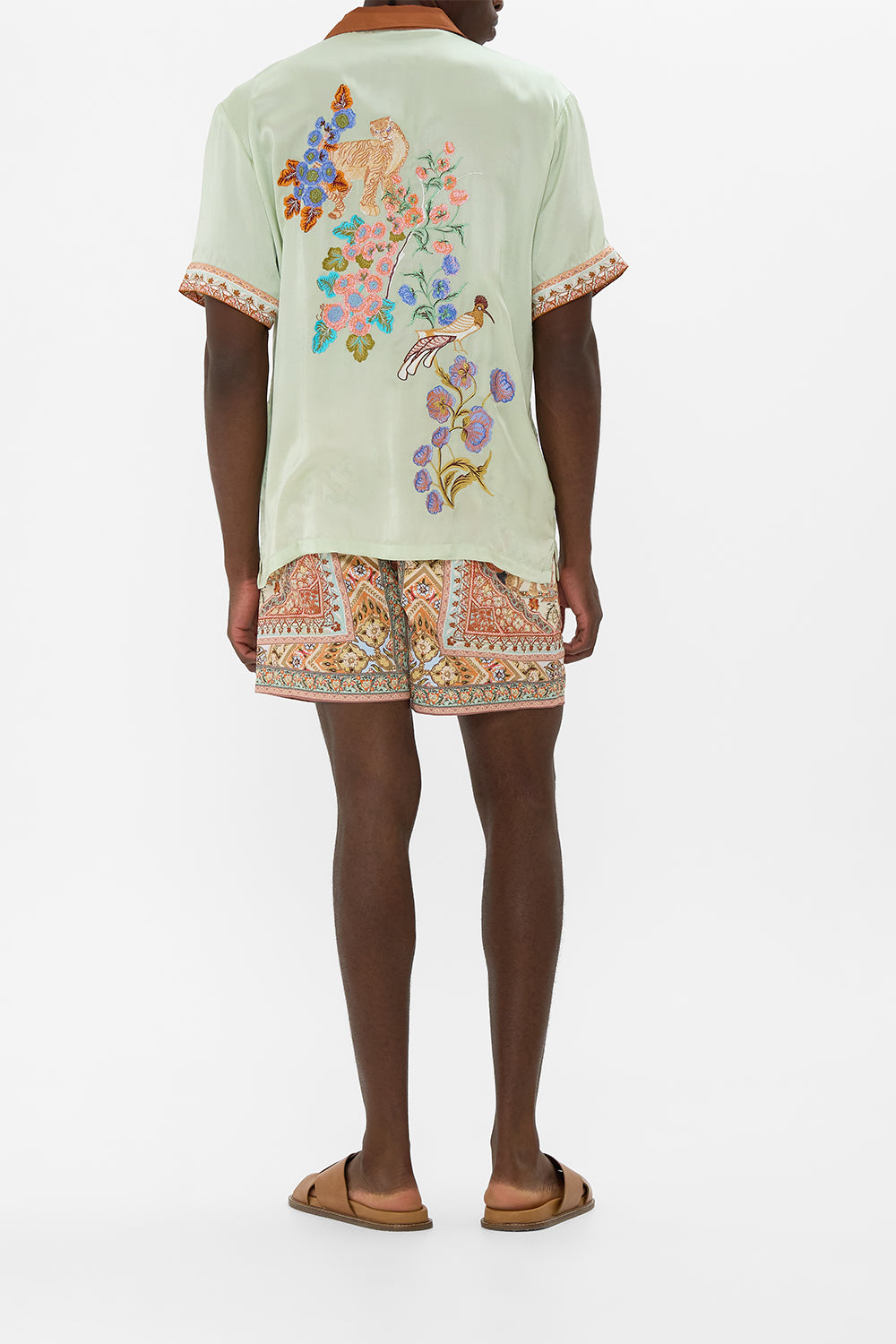 The CAMILLA SHORT SLEEVE CABANA SHIRT IN HONOUR OF HEIRLOOMS in our  print.