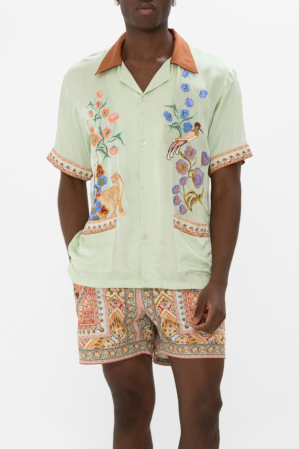 The CAMILLA SHORT SLEEVE CABANA SHIRT IN HONOUR OF HEIRLOOMS in our  print.