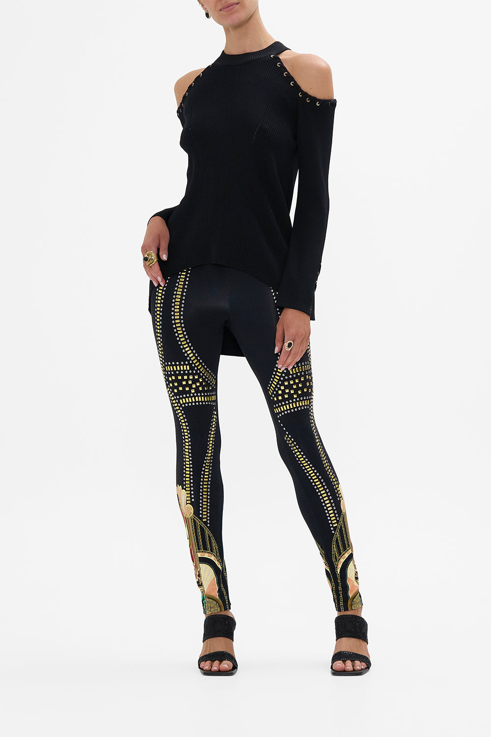 The CAMILLA COLD SHOULDER FLARED SLEEVE KNIT THEY CALLED HER NEFERTARI in our THEY CALLED HER NEFERTARI print.